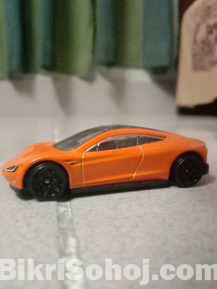 Hotwheels (Tesla Roadster), Matchbox (Tesla Model S)